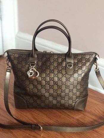 Sac cartable Gucci Guccissima en cuir marron gaufré,