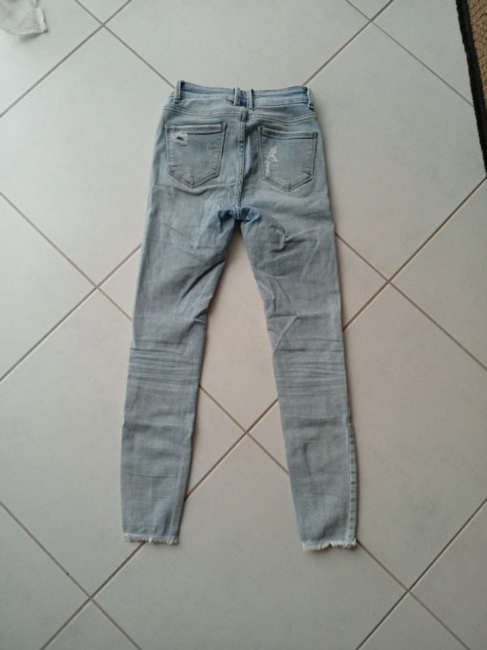 Jean skinny effet déchiré - photo numéro 2