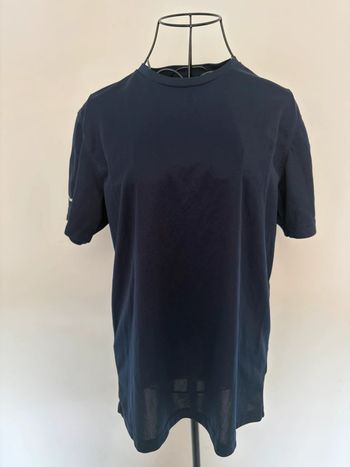 T-shirt de sport "TEX" taille M Je vends un t-shirt de sport "TEX", taille M, en très bon état.