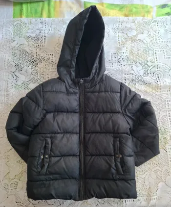 Doudoune noire garçon  - Kiabi 6 ans, en très bon état