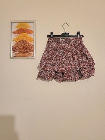 Jupe rouge- bordeaux  à fleurs  blanches "okaidi" taille  8 ans