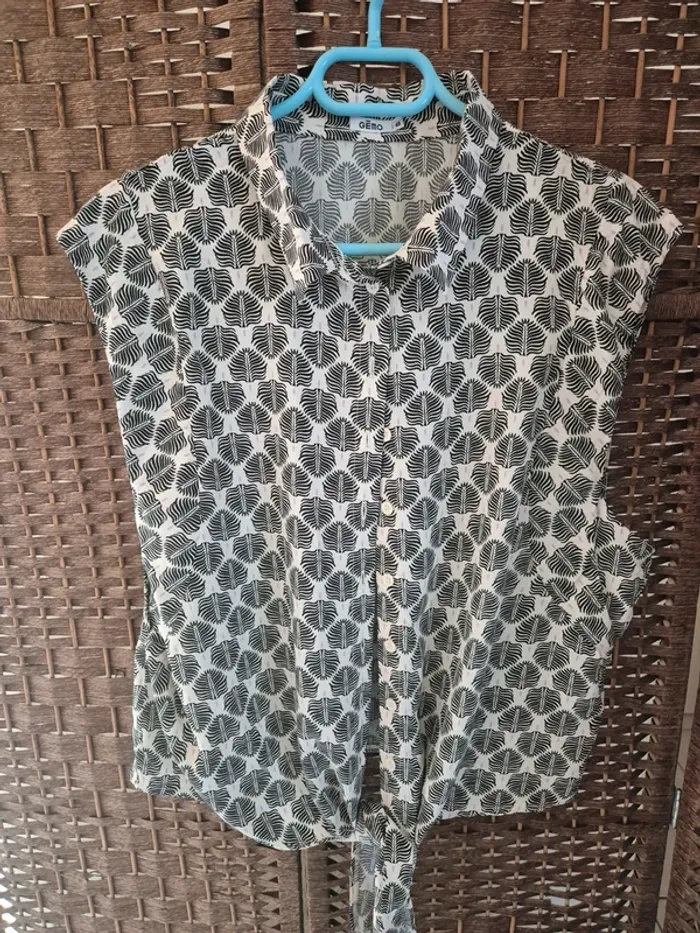 Chemise sympa sans manche taille 48