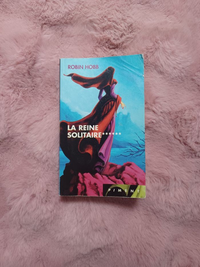 Livre roman: La reine solitaire
