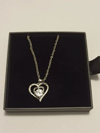 Collier avec pendentif double coeur