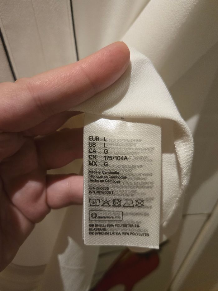 Blouse sans manches blanches T.L 42/44 H&M neuve - photo numéro 7