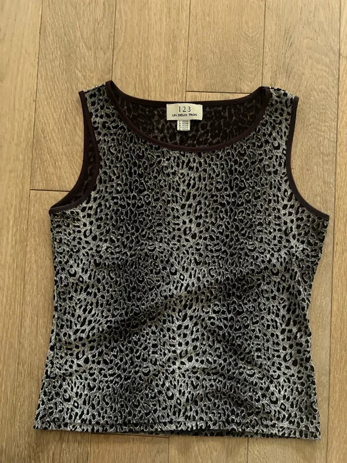 Débardeur panthère 123 taille 38/40 très bon état