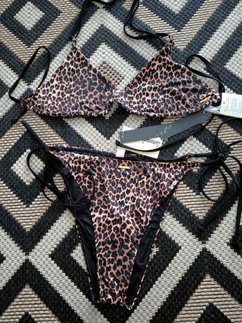Maillot de bain léopard taille 46-48 neuf