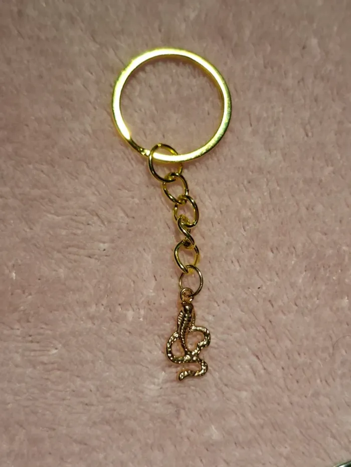 Porte-clé doré serpent 🐍
