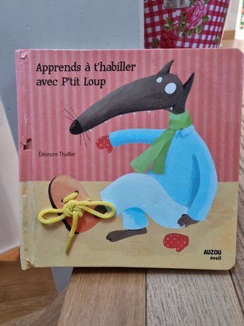 Apprends à t'habiller avec p'tit loup