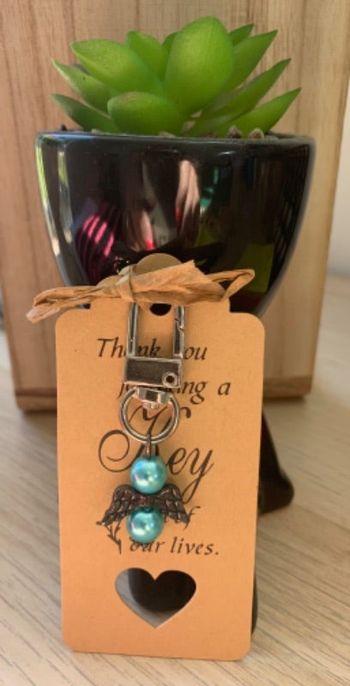 Porte-clés ou bijou de sac ange avec perles