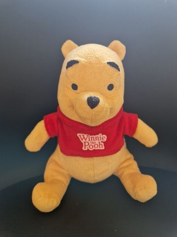 Peluche Winnie l'ourson en très bon état