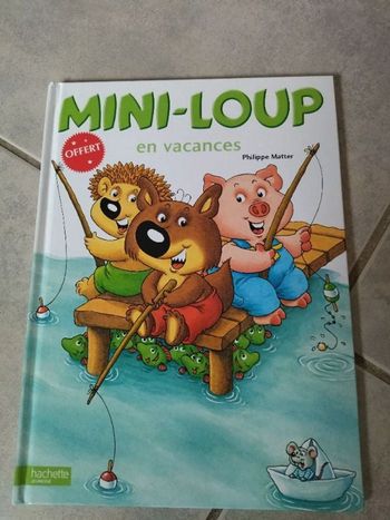 Mini loup en vacances