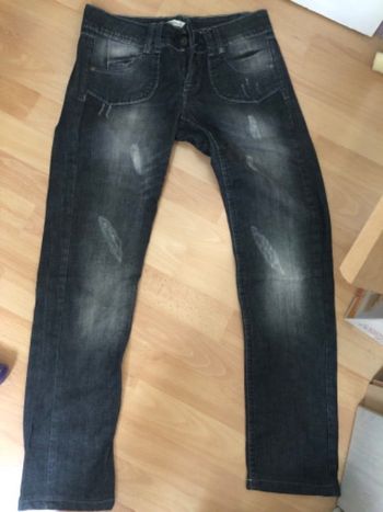 Jean effet délavé « abîmé » taille basse