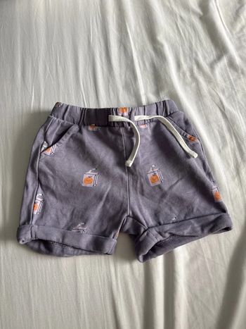 Short violet garçon