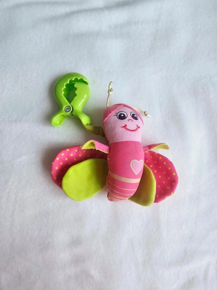 Magnifique peluche papillon fil ressort