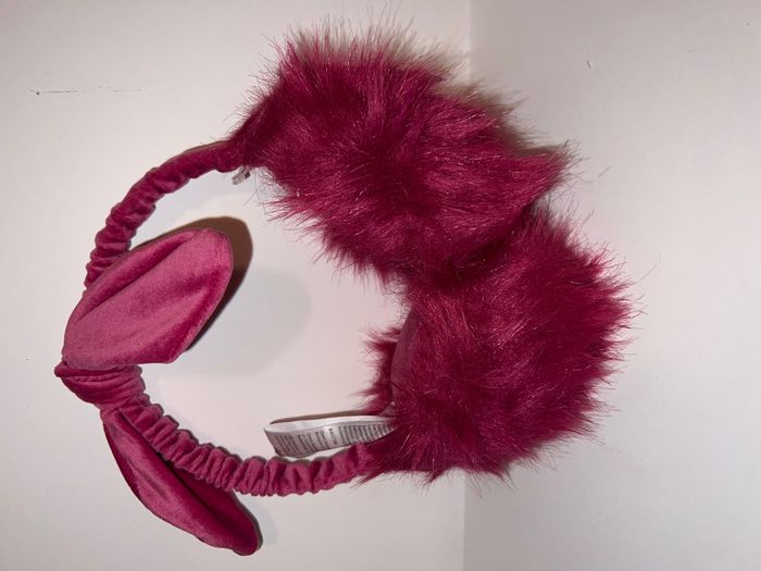 Cache oreilles pompons roses Claire's