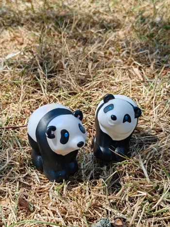 Couple panda little people