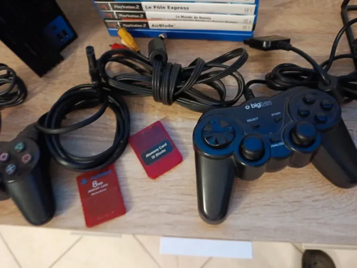 PlayStation 2 fat avec 2 manettes 2 cartes mémoire câbles et 5 jeux - photo numéro 5
