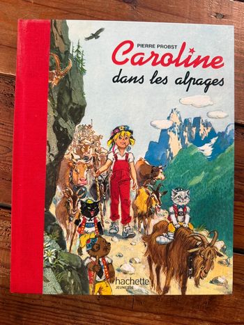 Moyen 1 - Livre édition limitée reliure rouge Caroline dans les Alpages Pierre Probst bd