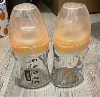 2 biberons  en verre 150ml Dodie