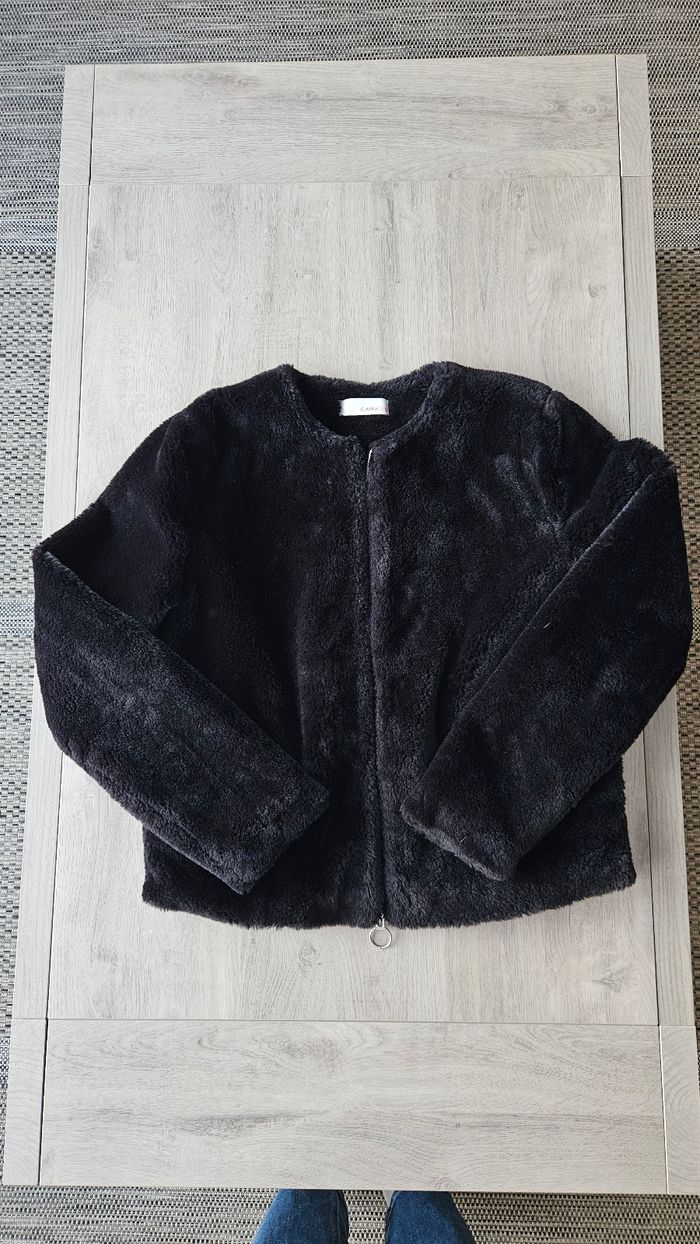 Veste fausse fourrure