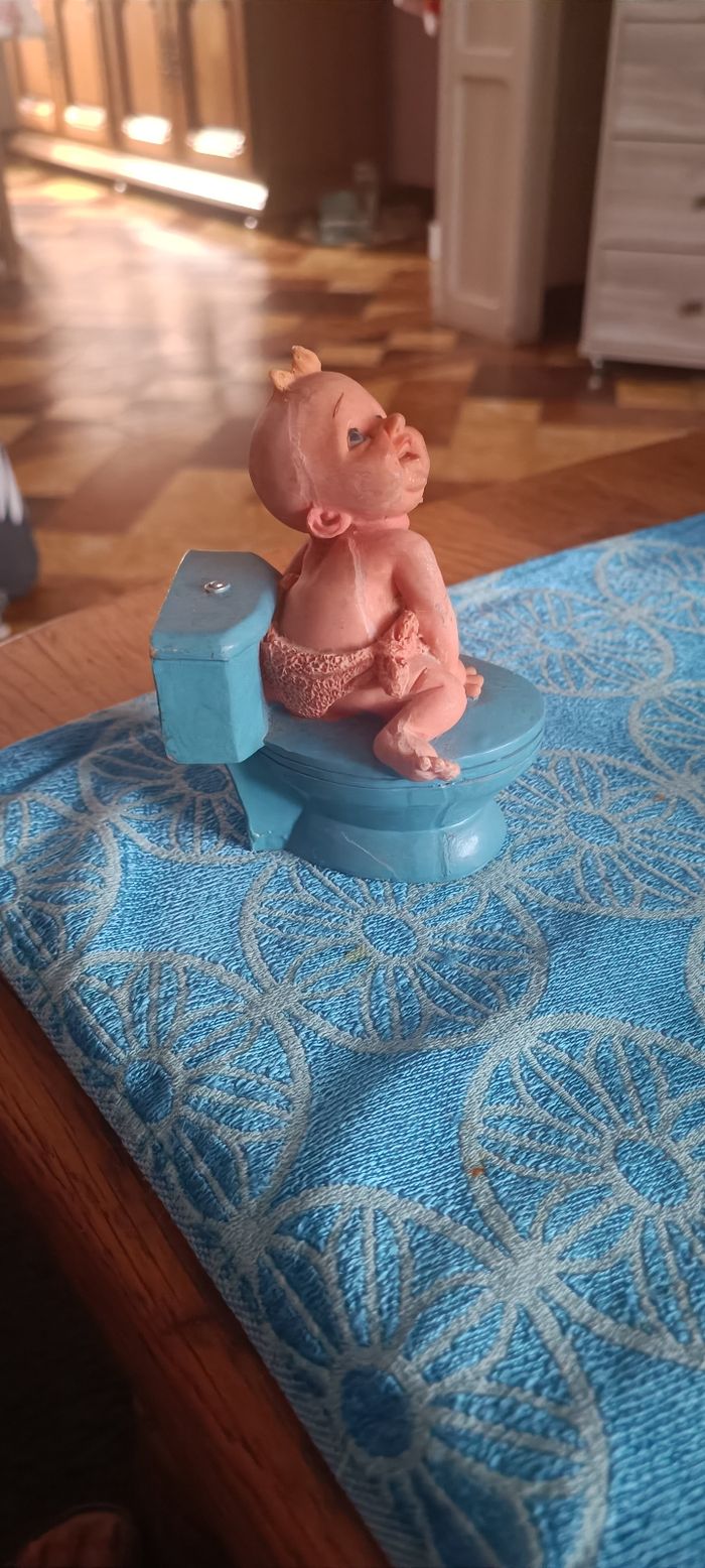 Posture bébé toilette - photo numéro 4