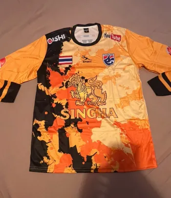 🟠 Maillot Thaïlandais 🇹🇭 SINGHA – orange / manches longues – Taille M – neuf sous blister