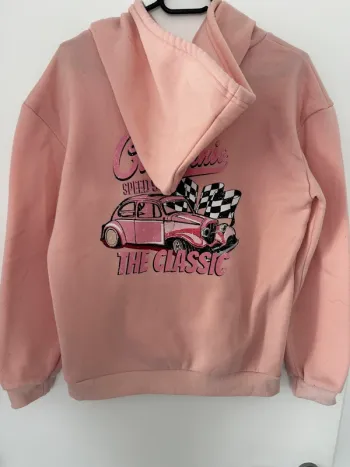 Sweat rose à capuche