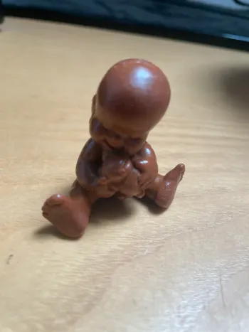 Figurine Vintage Babies numéro 46 Marron (1990)