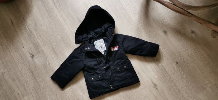 Manteau bleu marine bébé