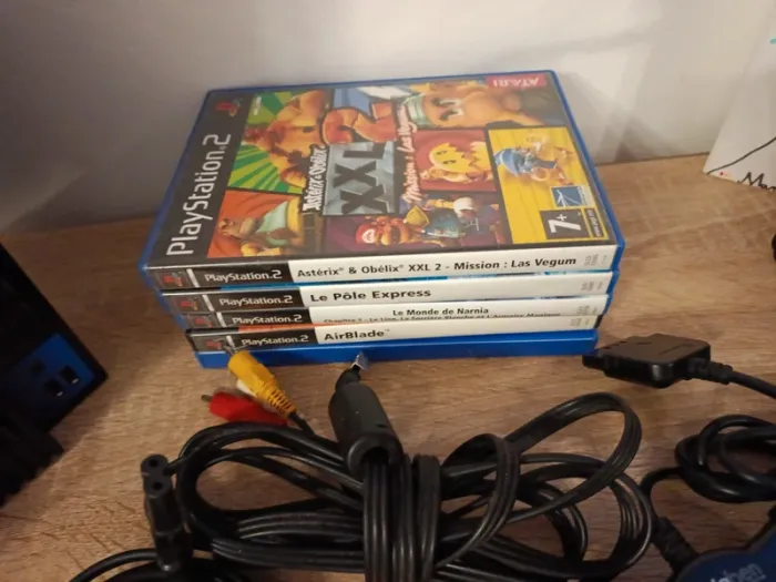 PlayStation 2 fat avec 2 manettes 2 cartes mémoire câbles et 5 jeux - photo numéro 6