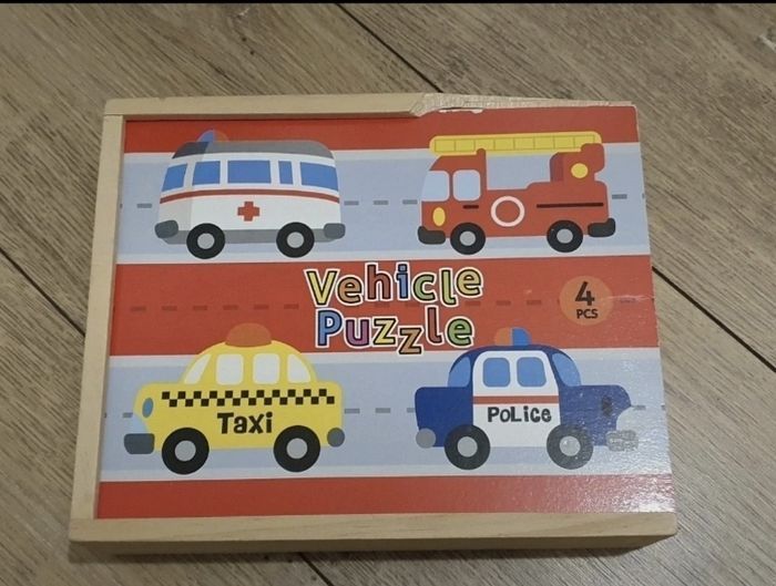 Boîte de 4 petits puzzles en bois