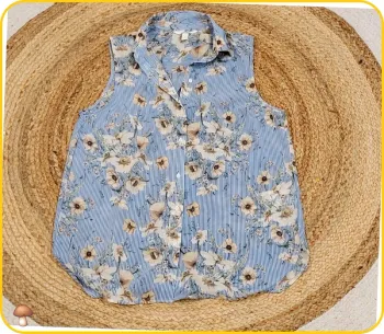 Chemisier sans manches fleuri H&M - Taille 38 - Bleu clair - Très bon état