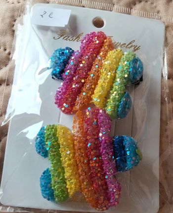 2 barrettes cheveux multicolores, étoiles, paillettes.