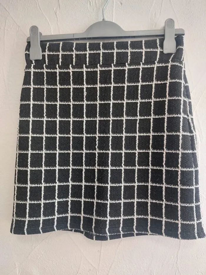 Jupe trapèze à carreaux en noir et blanc