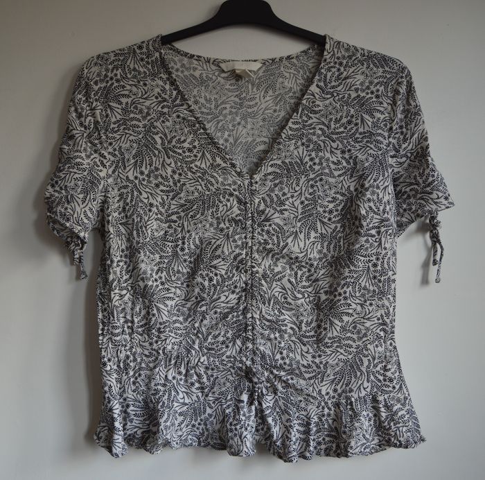 Haut femme H&M blanc imprimé noir feuillage taille 44