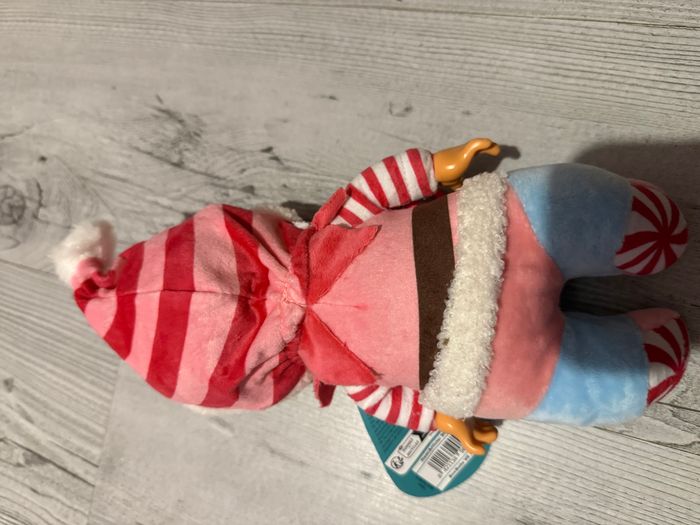 Poupée Cry Babies Tiny Cuddles Christmas Pixy - 23 cm, pleure de vraies larmes, pyjama rouge et blan - photo numéro 2