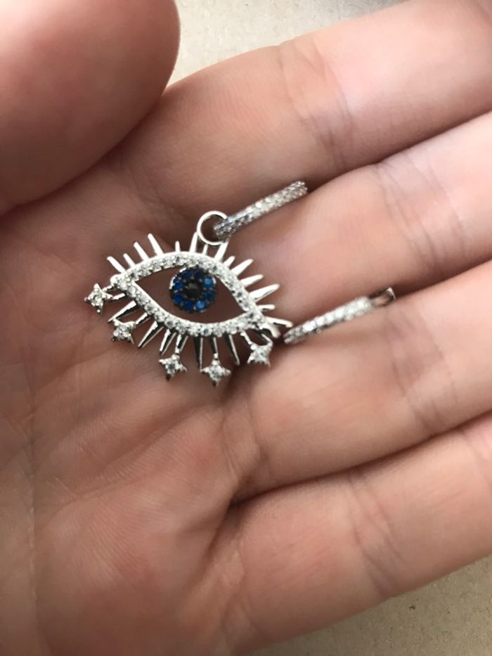 boucle d oreille oeil bleu argente