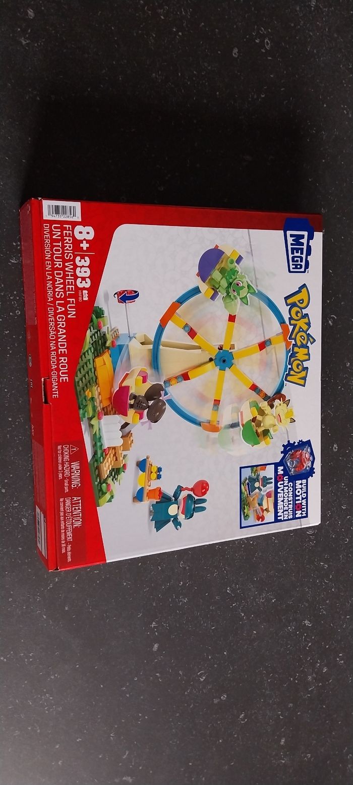 Un tour dans la grande roue pokémon 8+ Mega