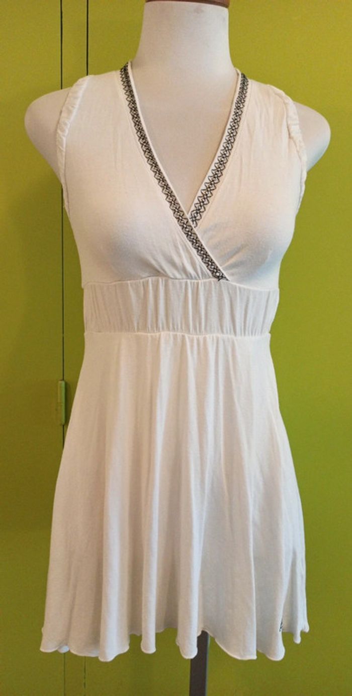 Lot des bluses asimétriques la noir est xs la blanche, et la bleue s/m