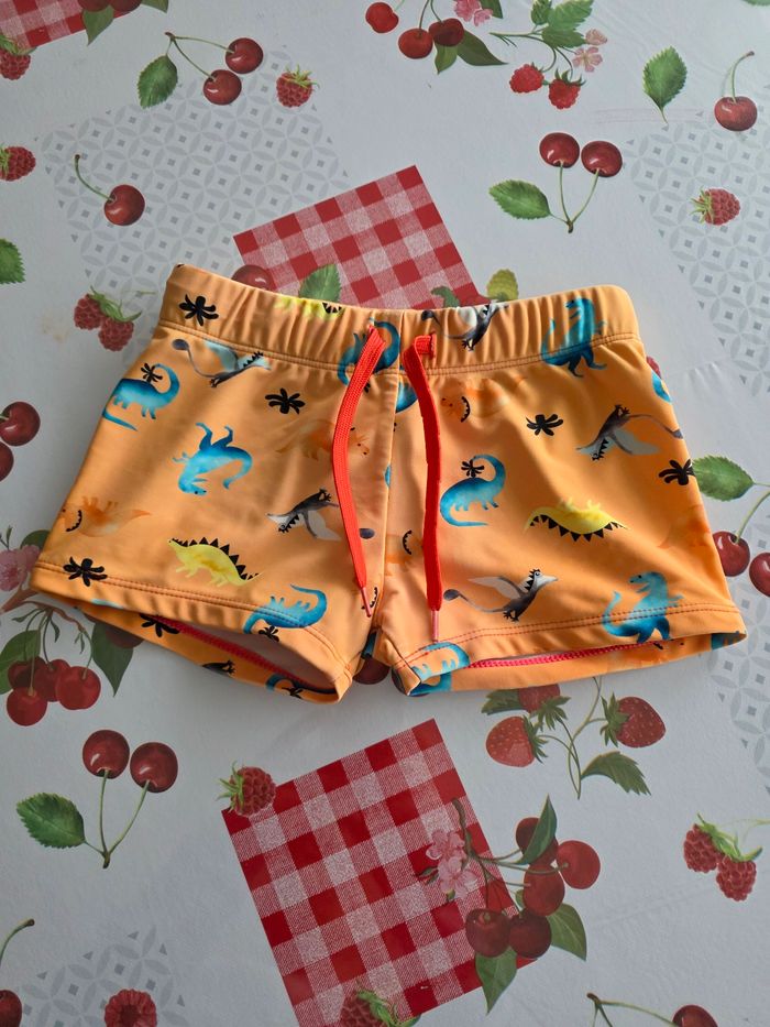 MAILLOT DE BAIN GARÇON  MOTIFS DINOSAURES AVEC UN CORDON POUR SERRER TAILLE 8ANS MARQUE GÉMO