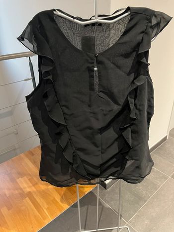Blouse noir sans manche T46