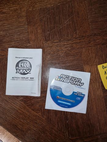 Action replay ps2 avec sa notice