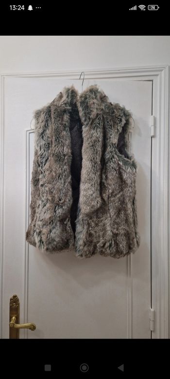 Manteau sans manche fausse fourrure