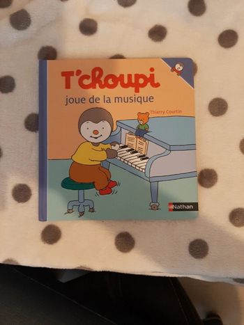Livre t'choupi tchoupi joue de la musique