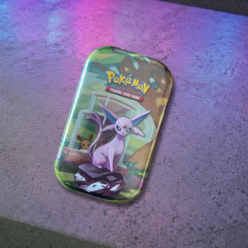 Boîte Mini-Tins Pokémon Mentali - Évolutions Prismatiques (Neuf Scellé)