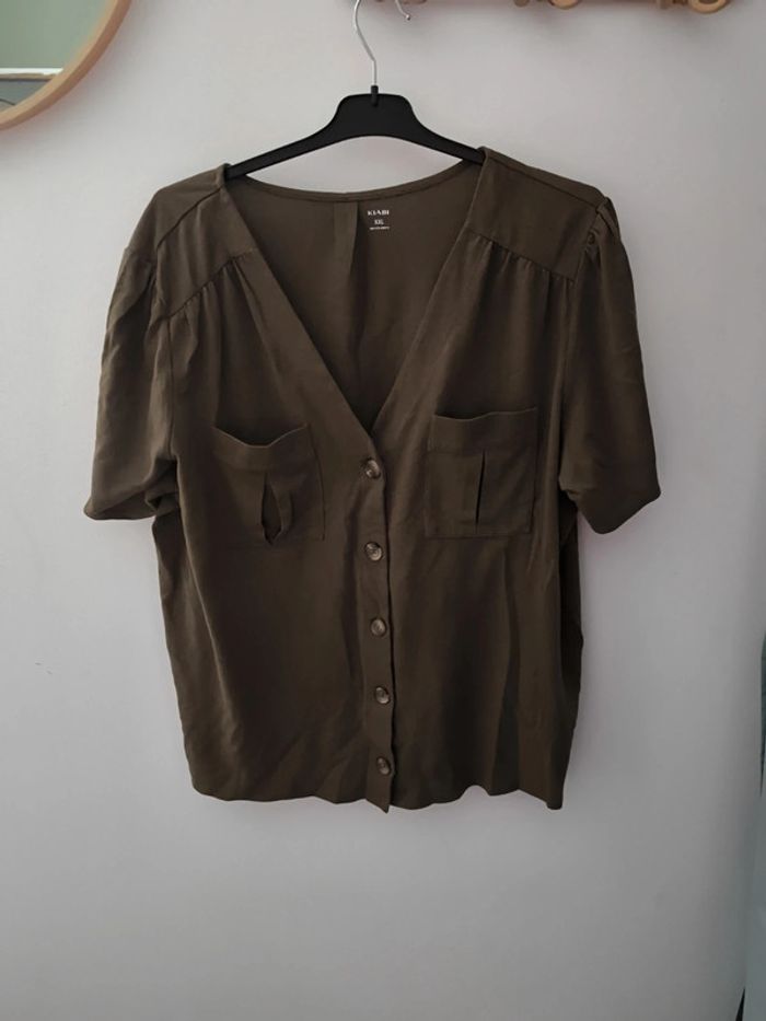 T-shirt blouse manches courtes