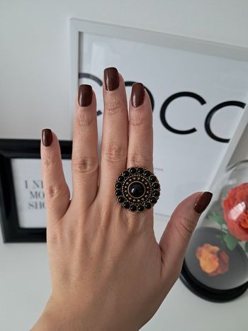 Bague noire et dorée