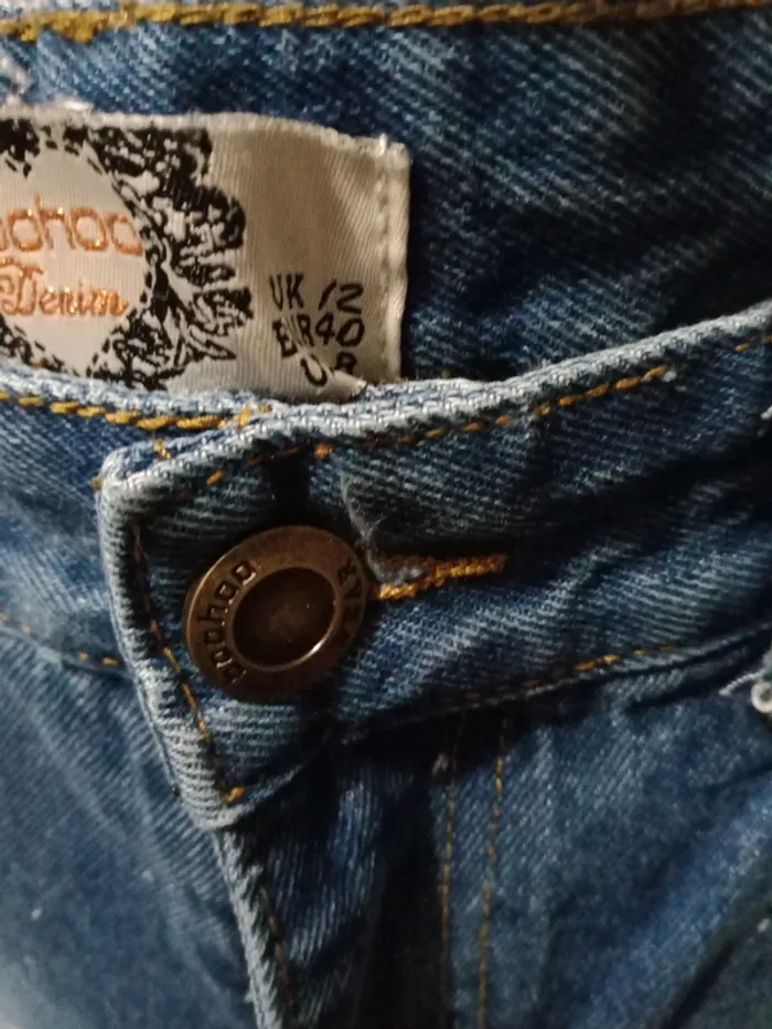 Jeans bleu troué - photo numéro 6