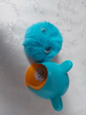 Animal pompon dans sa maison